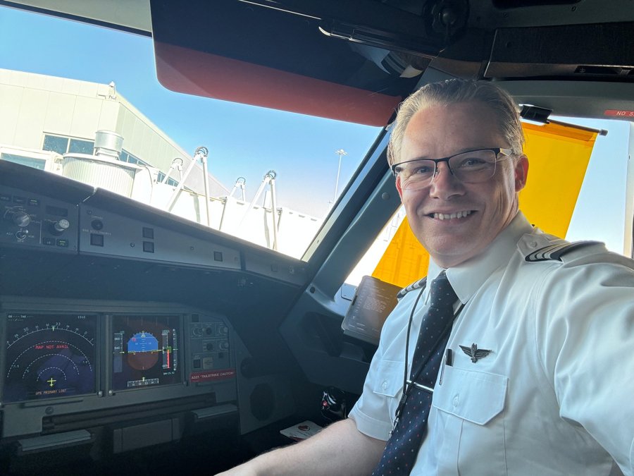 Team member in the flight deck of a commercial aircraft